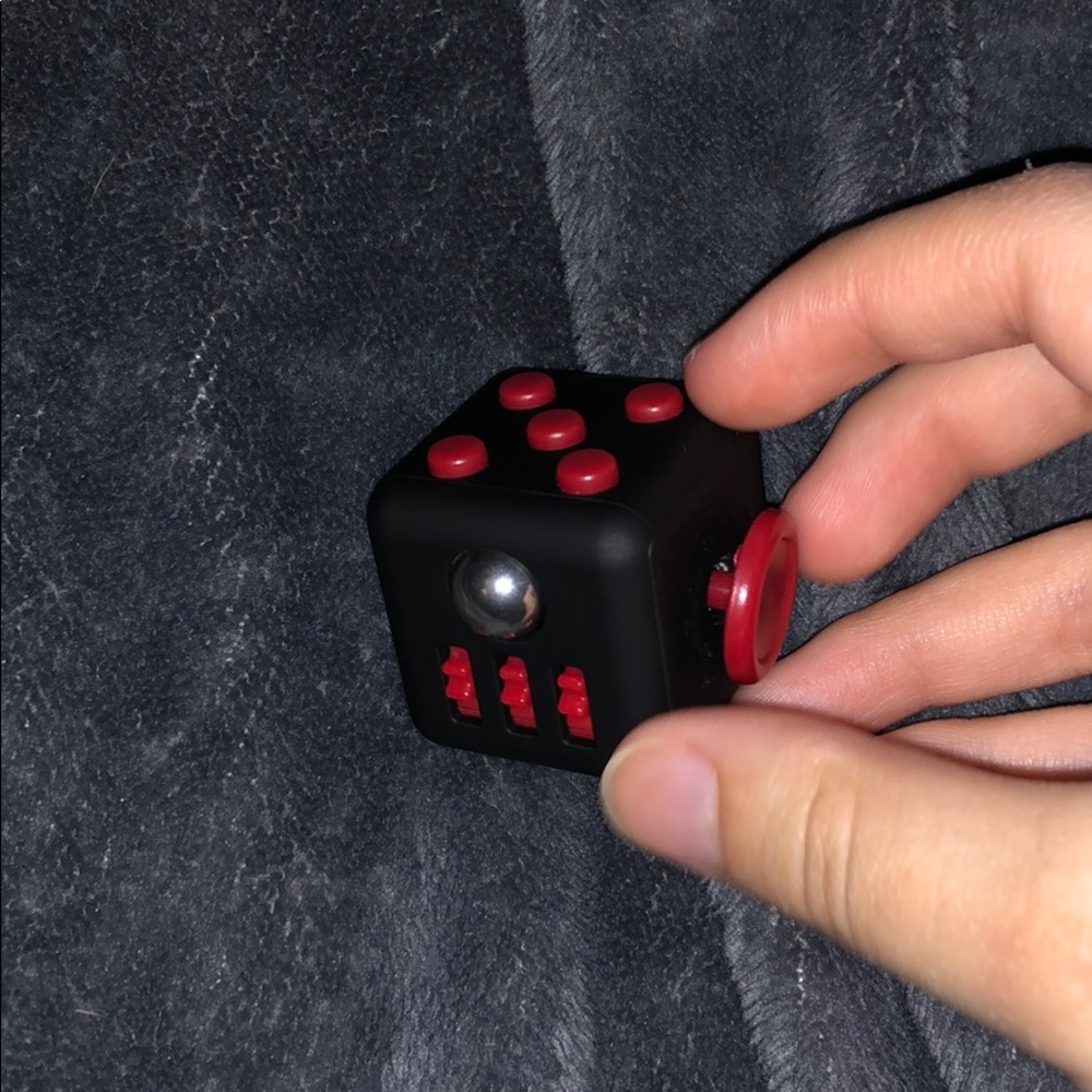 Black and red fidget cube